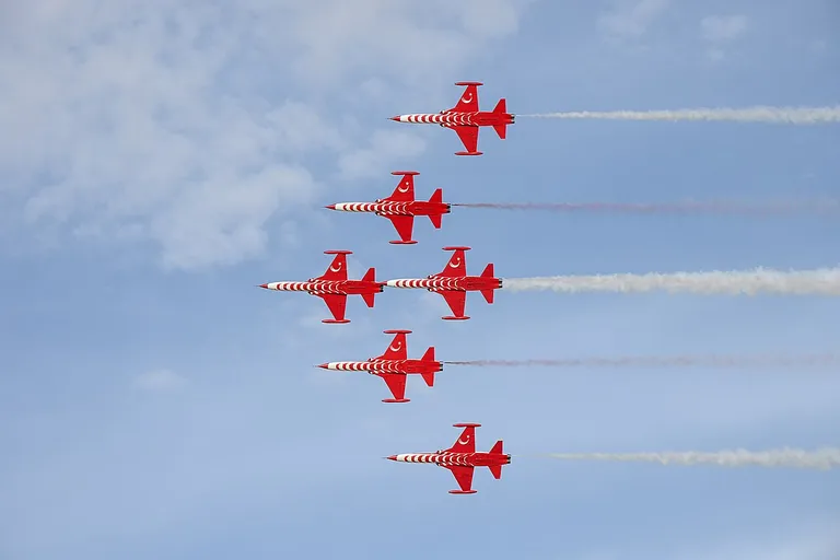Aerobatic jets flying over the World Defense Show in Saudi Arabia