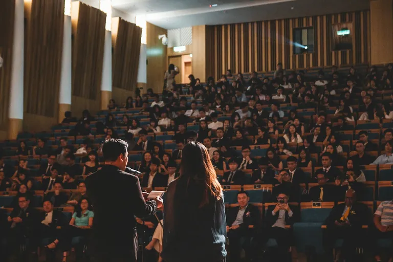 Attendees seated in a conference room