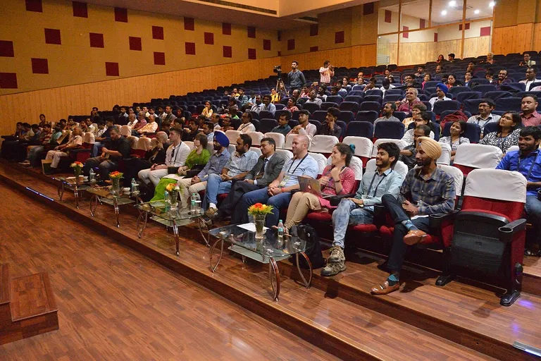 Audience during a keynote session at a business conference