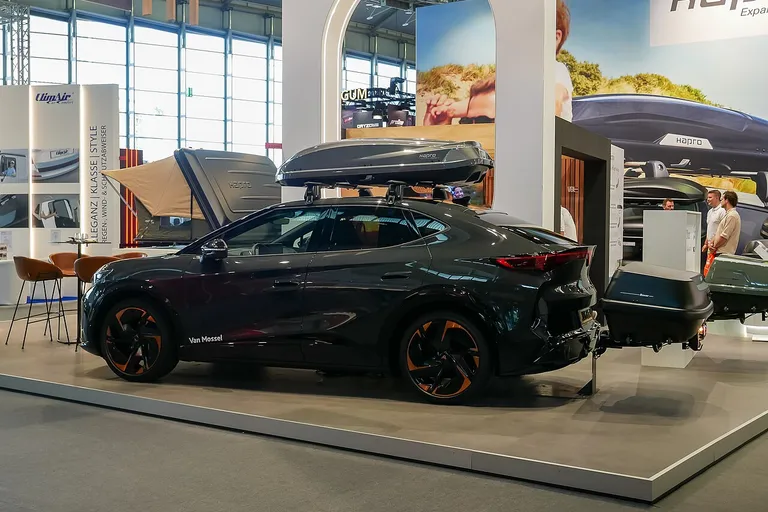 Automotive aftermarket products on display at an Automechanika trade fair stand