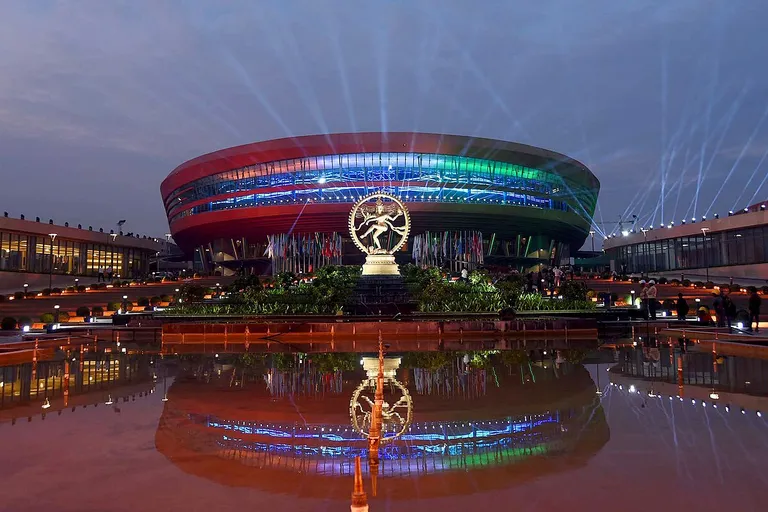Bharat Mandapam convention centre in New Delhi at dusk
