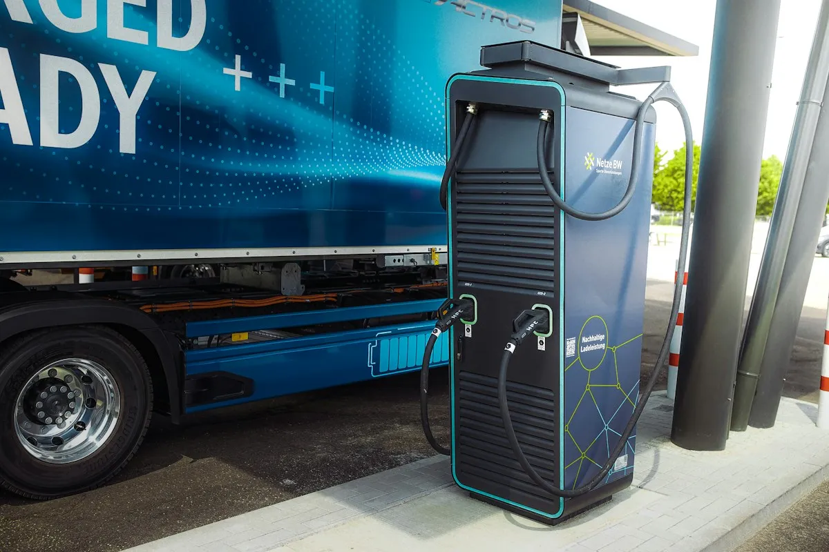 Blue electric work truck with its door open
