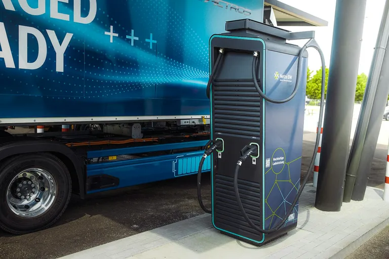 Blue electric work truck with its door open