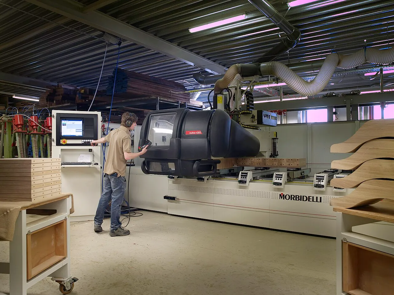 CNC woodworking machine with a suction table