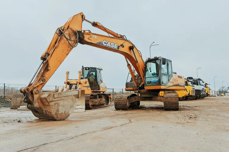 Excavator on a concrete road