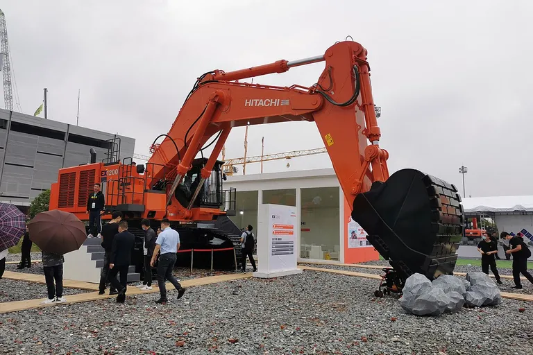 Excavator on display at a construction equipment exhibition