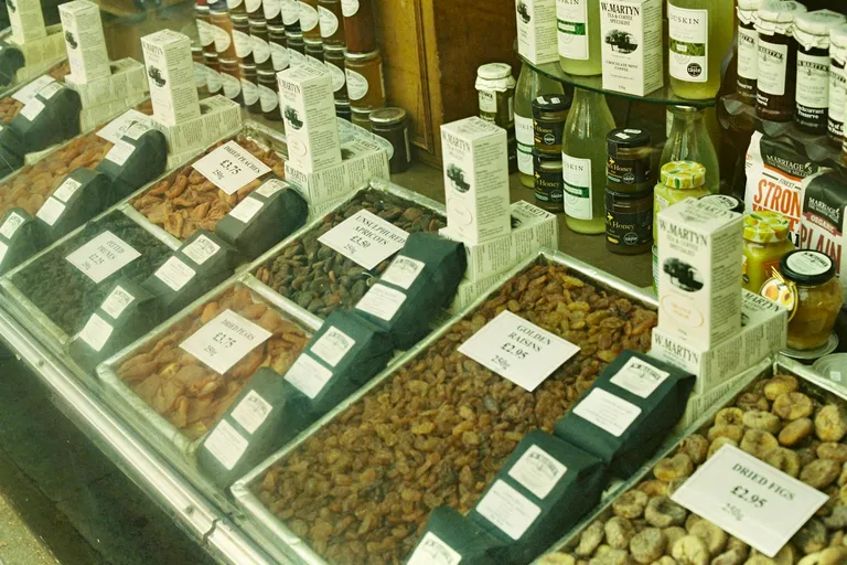 Grocer's window with dried fruit and jars