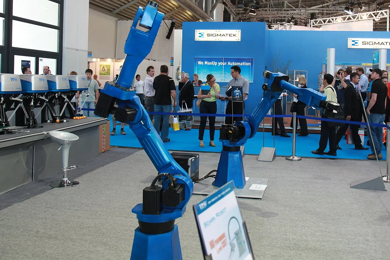 Industrial robot arm demonstrated at a technology exhibition
