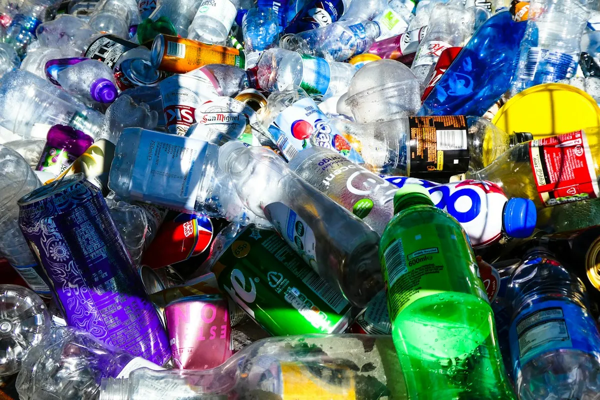 Pile of plastic bottles and cans for recycling