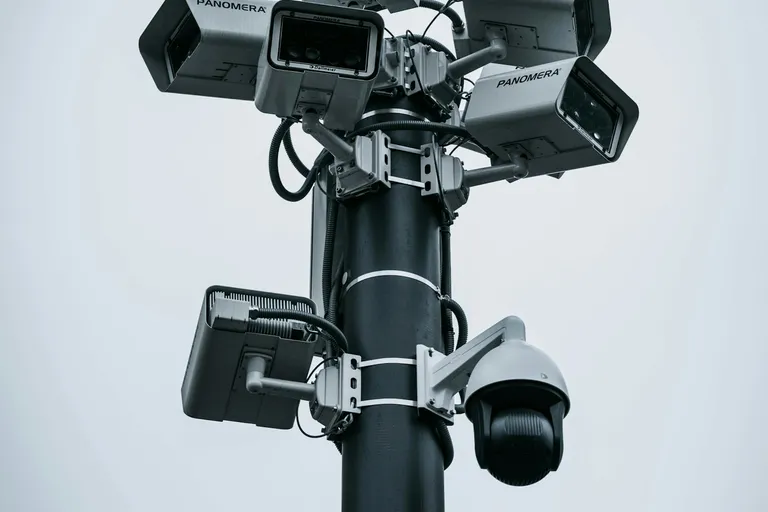 Pole mounted with multiple surveillance cameras