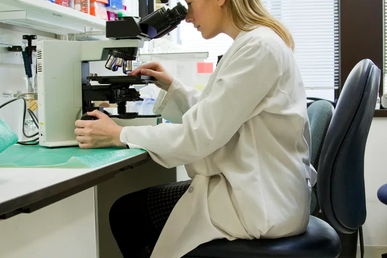 Researcher working in a cancer research lab