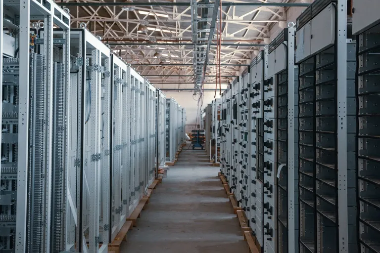 Server room aisle with equipment racks