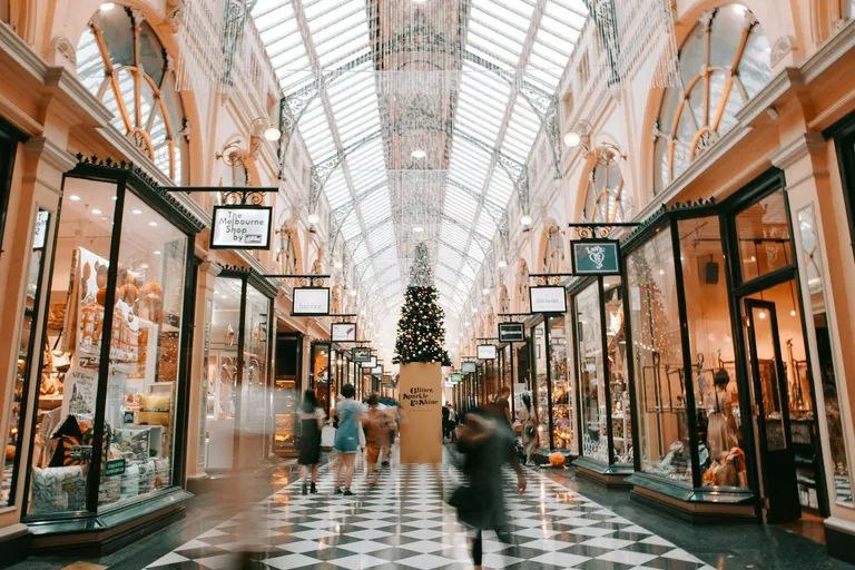 Shopper walking inside a shopping center