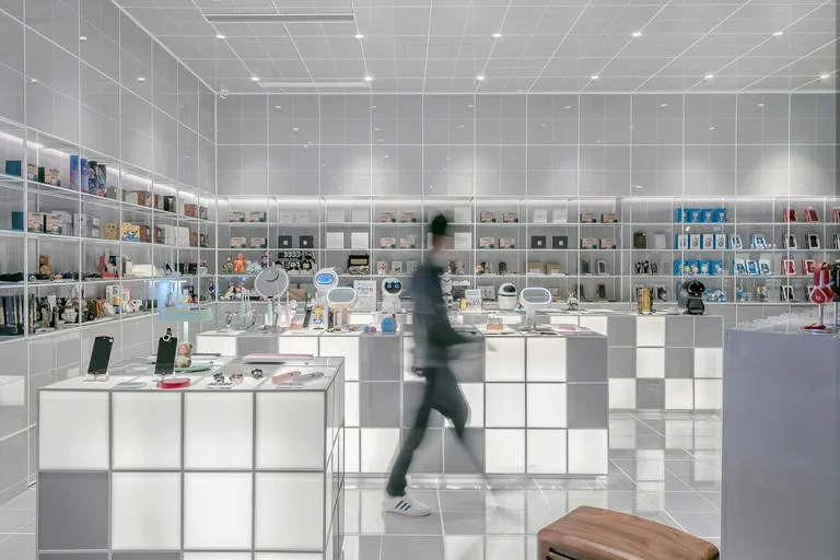 Shopper walking through a modern retail space